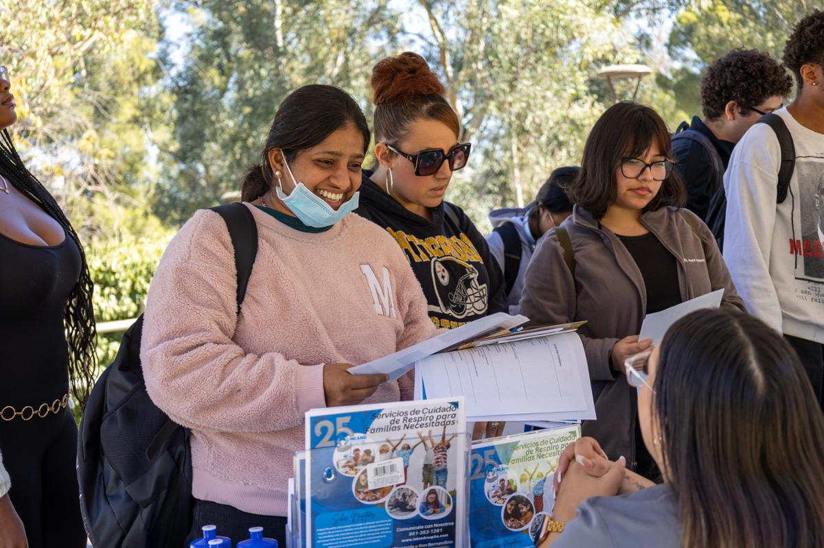 Career Expo student at a table