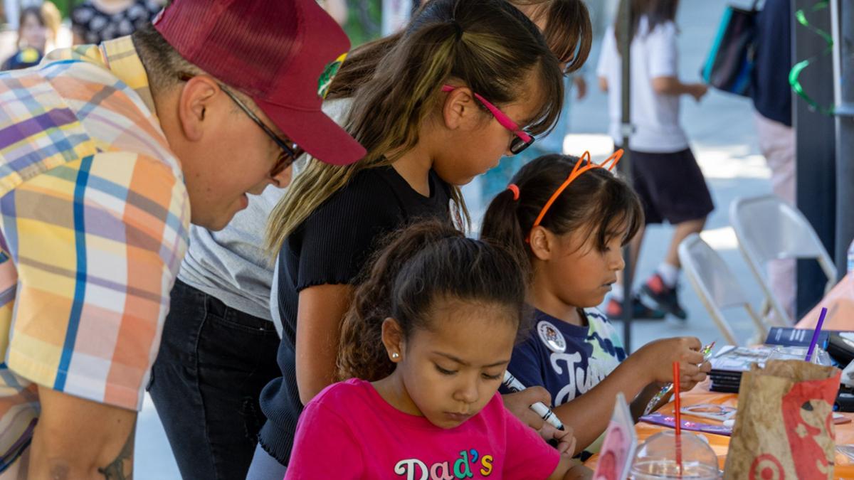 Community members enjoying the arts and crafts