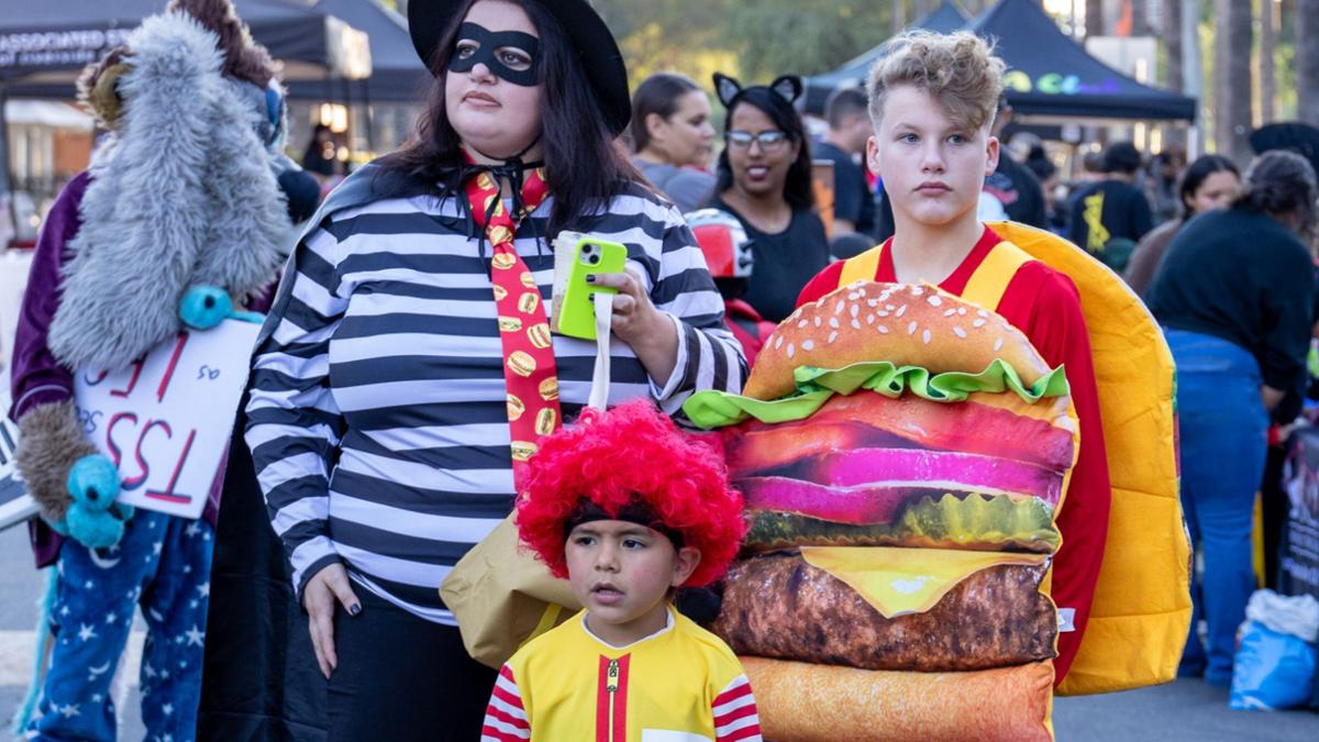 People in festive fast food inspired costumes