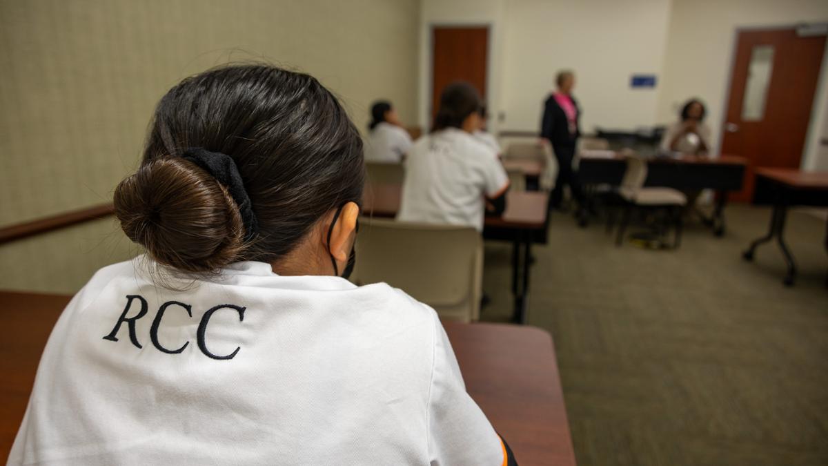 Back of nursing student in a classroom