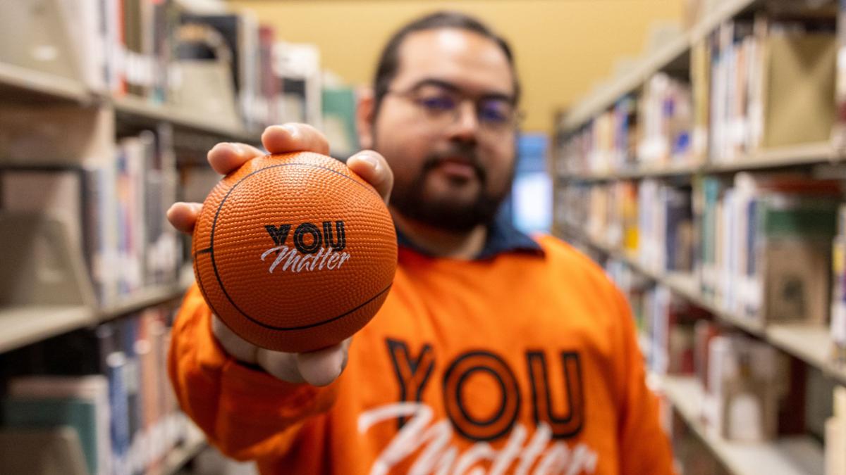 Sotheara Ly with a basketball 