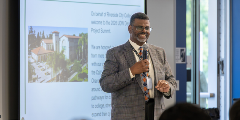 Dr. Bishop speaking at the UDW event