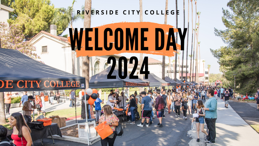 Welcome Day Banner with students at a resource fair