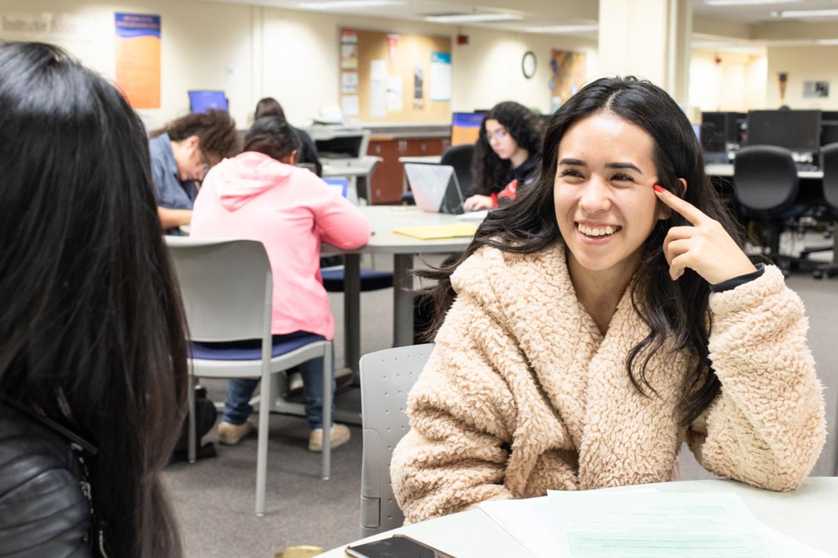 Students laughing while talking